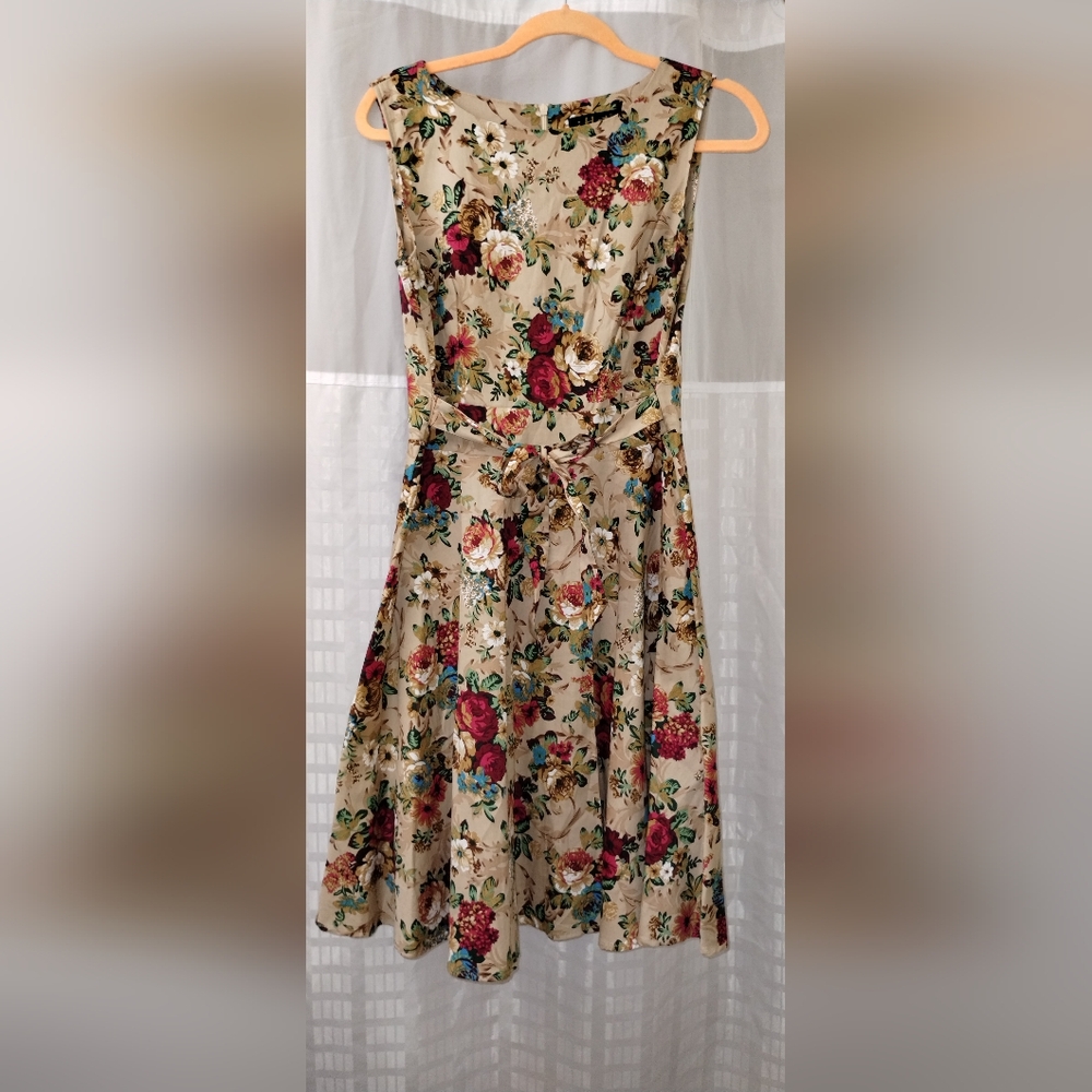 Sleeveless Beige Aline Floral Print zip Knee Length. tied in front or back